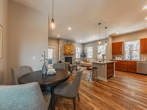 Dining area and Great Room with fireplace. Kitchen are on the right
