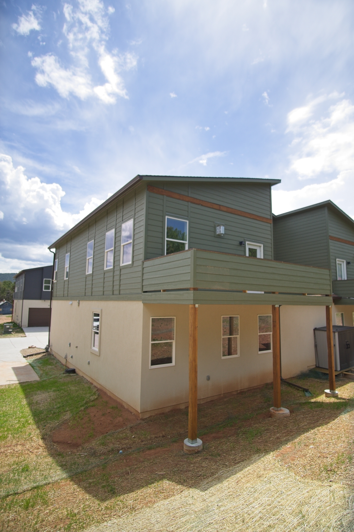 Rear deck and yard area of 312 Spruce Meadow Grove