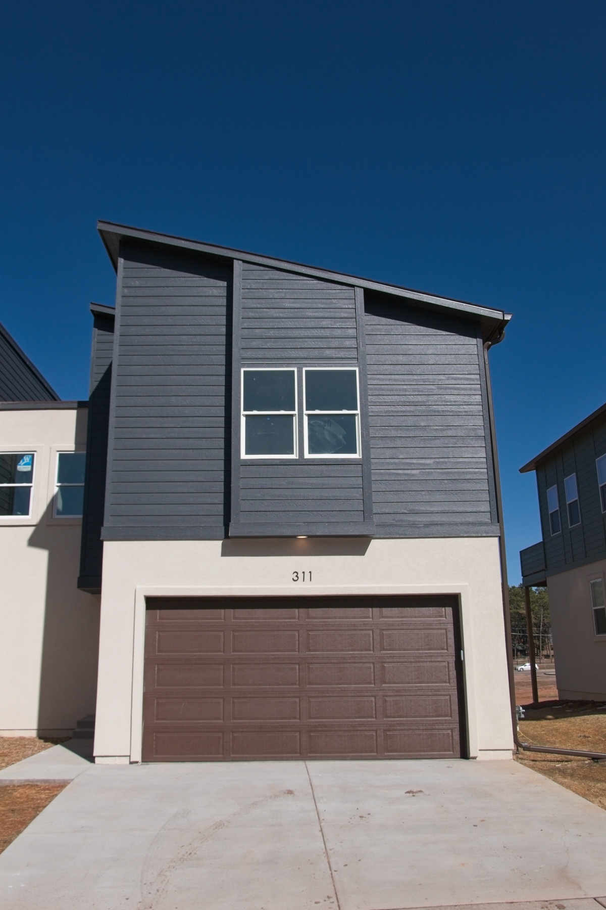 Exterior front of 311 Spruce Meadow Grove townhome